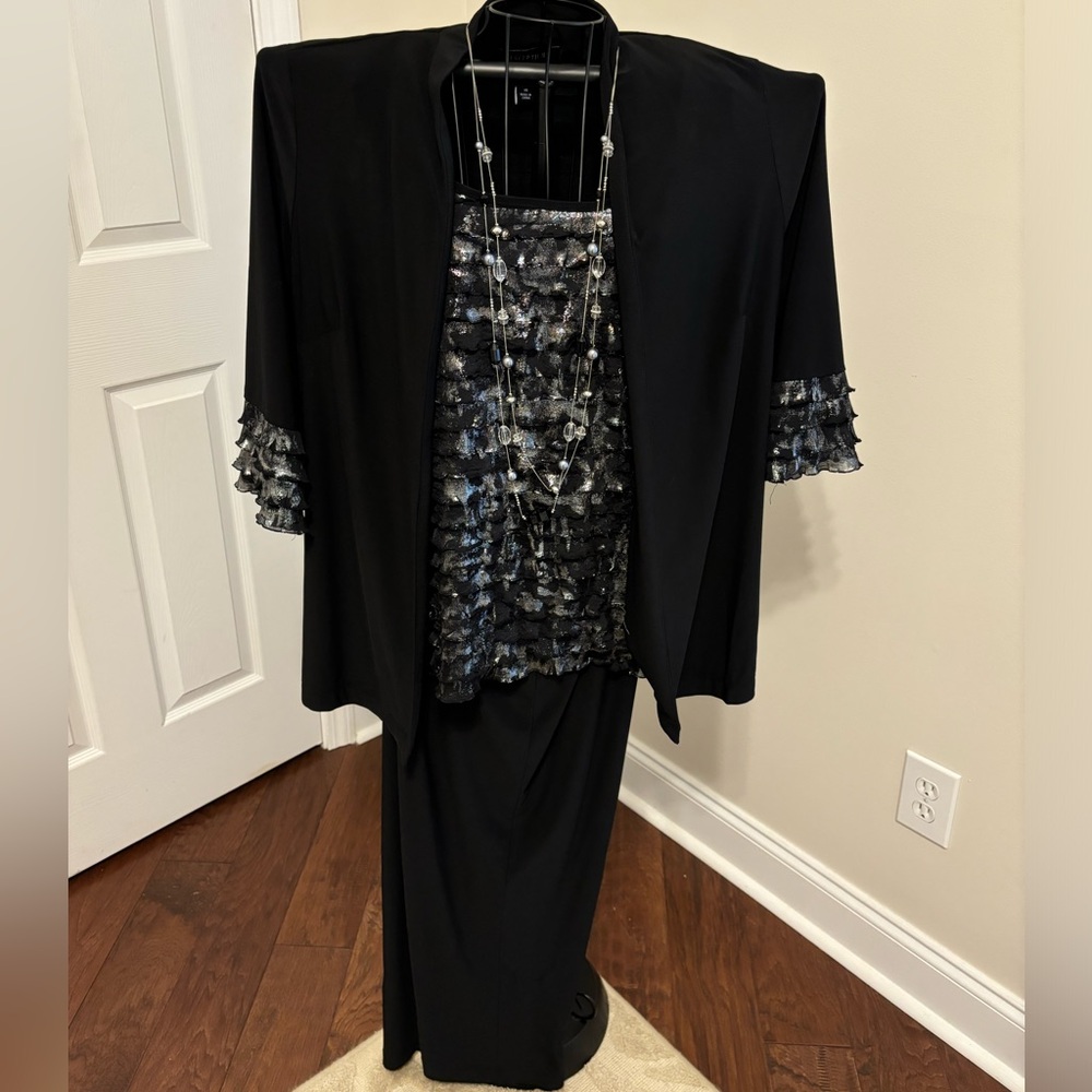 3 piece evening suit with layer ruffle detail & coordinating necklace.